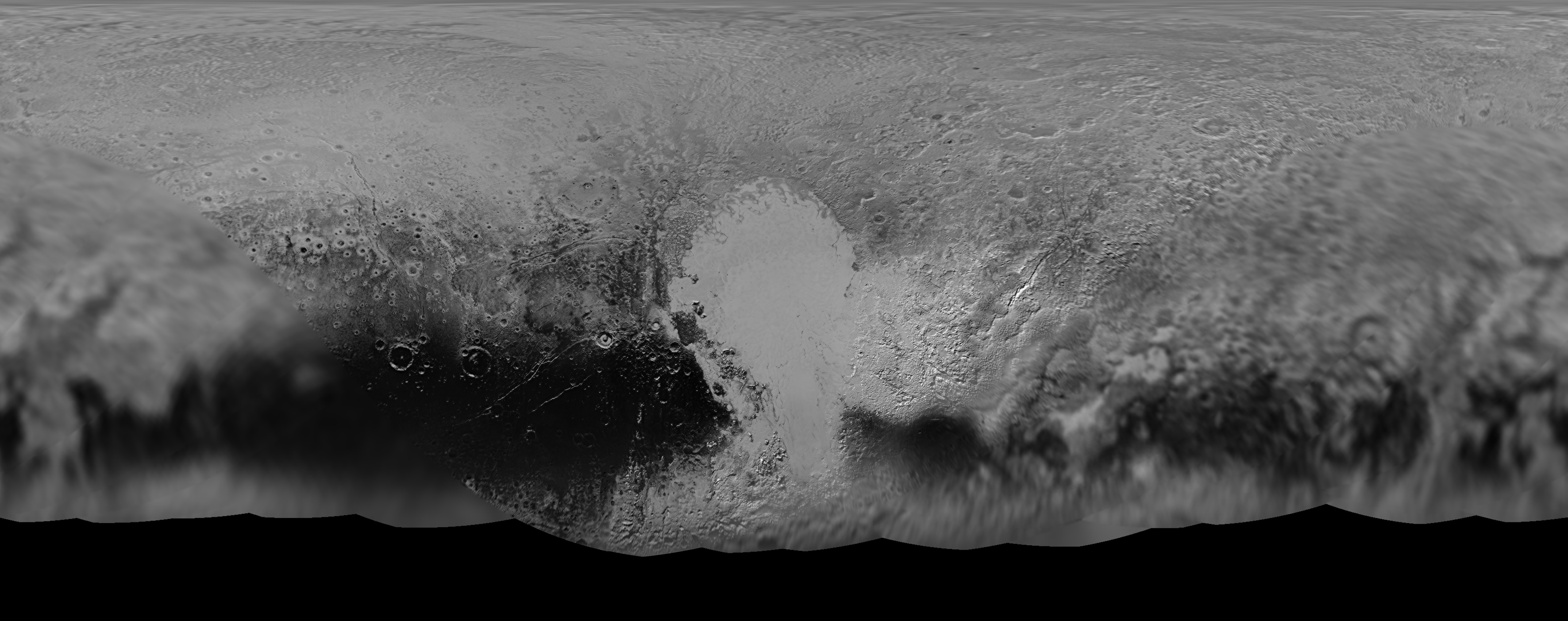 Fig 4 (b): Panchromatic composite global map of Pluto created from images taken at varying distances, and hence, at different resolutions. Sputnik Planum is clearly visible. The dark features along the equatorial region are also clearly resolved. Note that much of the southern hemisphere, currently tilted away from the Sun, is not shown in this map. Credit: NASA/JHUAPL/SwRI