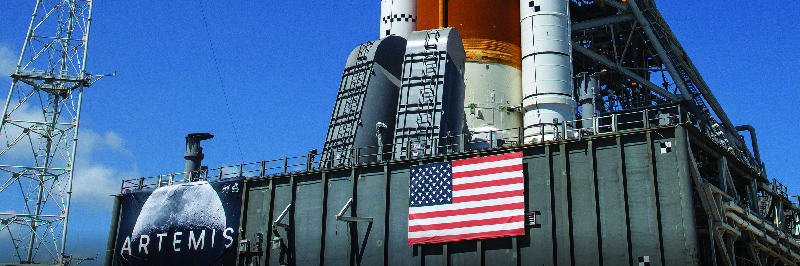 View of lower part of NASA SLS rocket atop Mobile Launch Platform